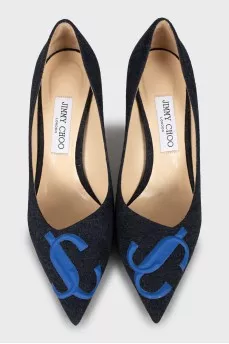 Textile shoes with embossed logo