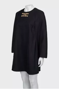 Black dress with gold logo