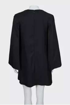 Black dress with gold logo