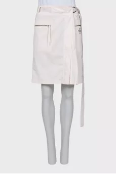 Skirt with patch pockets and tag
