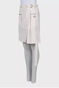 Skirt with patch pockets and tag