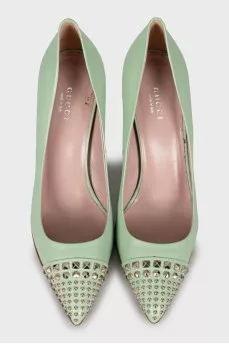 Leather shoes with metal rhinestones