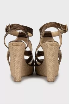 Leather sandals with woven wedge heel