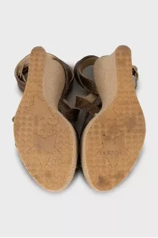Leather sandals with woven wedge heel