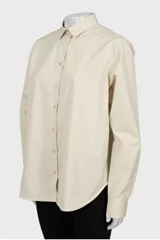 Beige shirt long at the back