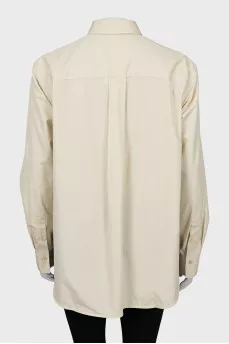 Beige shirt long at the back