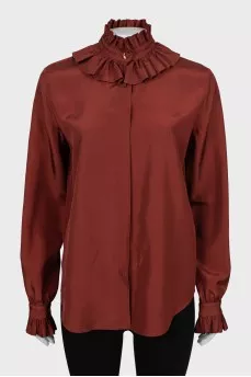 Shirt decorated with frills