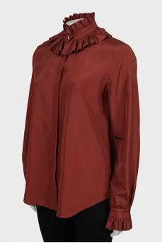 Shirt decorated with frills