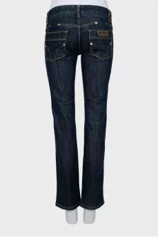 Low-rise jeans with gold hardware