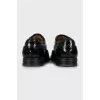 Black patent leather brogues