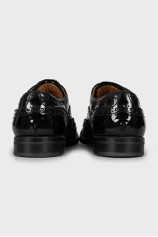 Black patent leather brogues