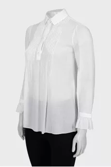 Sheer blouse with ruffled cuffs