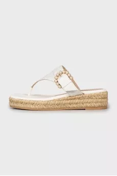 Flip-flops with woven soles