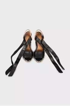 Leather sandals with woven platform