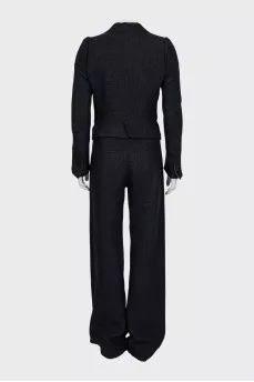 Suit with trousers with small polka dots