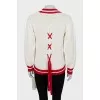 Knitted pullover with tag