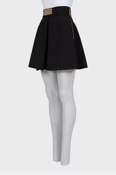 Mini skirt with golden decoration