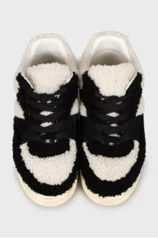 Black and white fur and leather sneakers