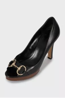 Leather shoes with wooden soles