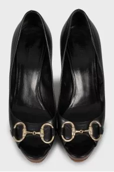 Leather shoes with wooden soles