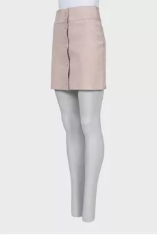 Suede miniskirt with snap buttons and tag