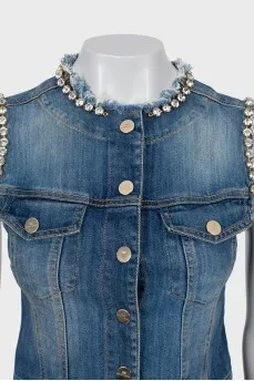 Denim vest decorated with rhinestones