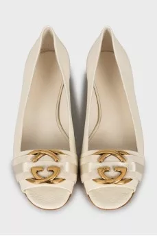 Leather ballerinas with metal logo