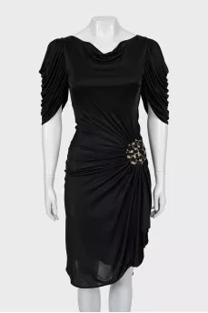 Black dress decorated with drapery