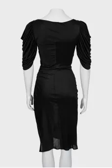 Black dress decorated with drapery