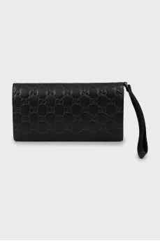 Leather clutch with embossed print