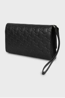 Leather clutch with embossed print