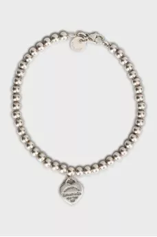 Silver bracelet with pendant