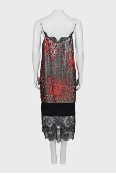 Dress with straps decorated with weaving
