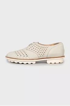 Perforated suede shoes