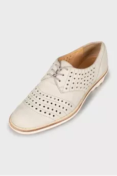 Perforated suede shoes