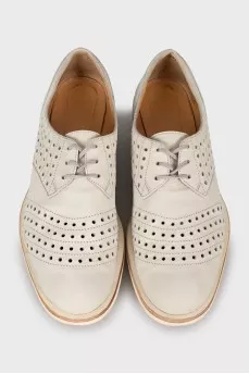 Perforated suede shoes