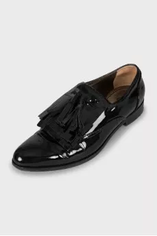 Patent leather loafers with fringe