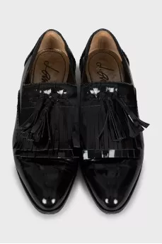 Patent leather loafers with fringe