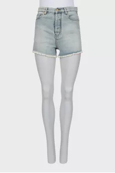 Blue denim shorts with raw hem