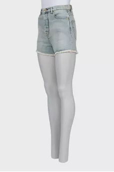 Blue denim shorts with raw hem