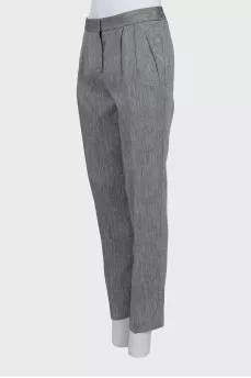 Trousers with arrows in fine print