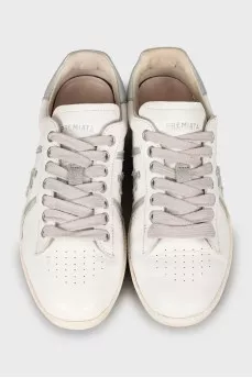 Leather sneakers with printed soles