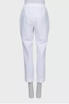 Straight trousers with elastic