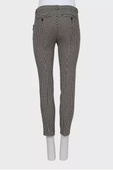 Black and white trousers with arrow print