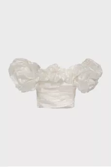White blouse with puff sleeves and tag