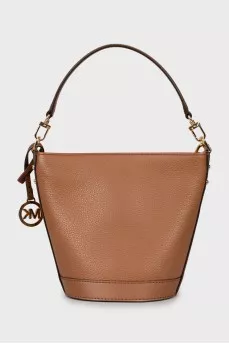 Leather bucket bag with tag