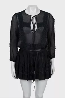 Transparent dress decorated with lace