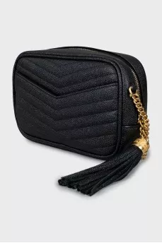 Leather bag with gold strap and logo