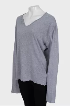 Gray long sleeve with a patch on the back