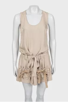 Beige jumpsuit with ruffles